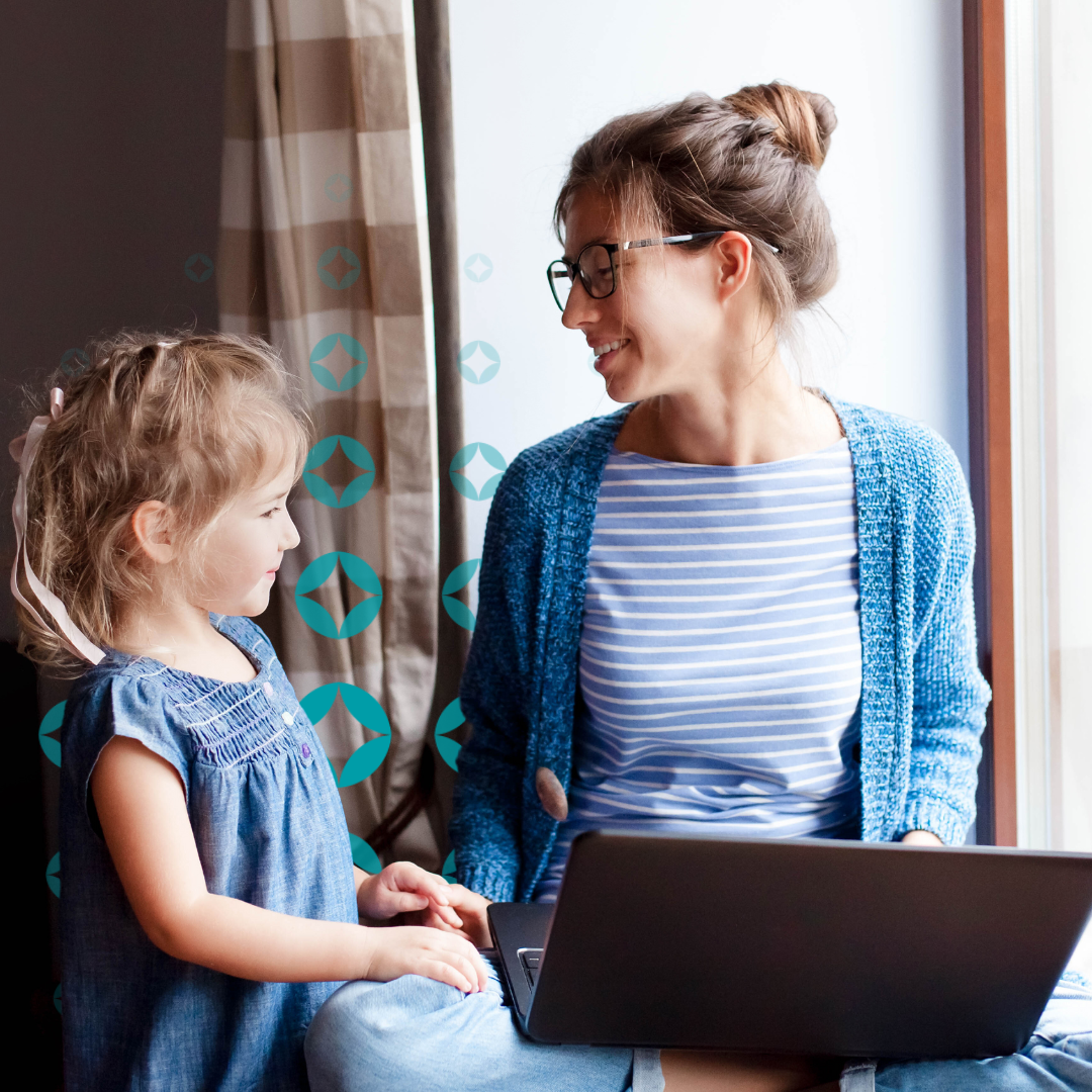Mother Working from Home with Daughter